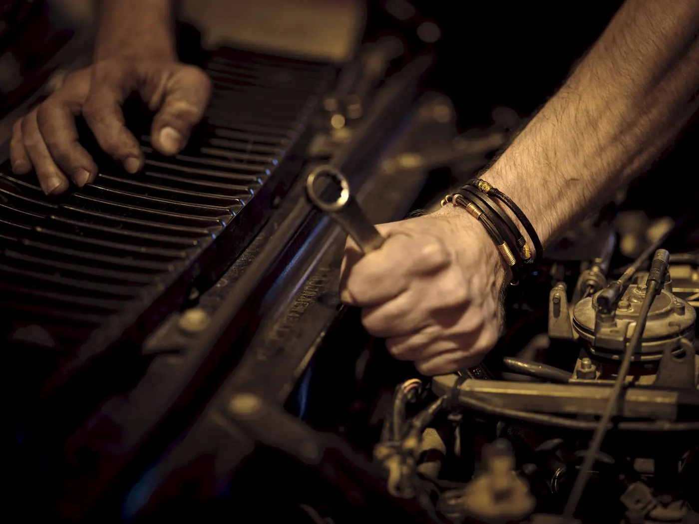 Hands on a wrench in the bay